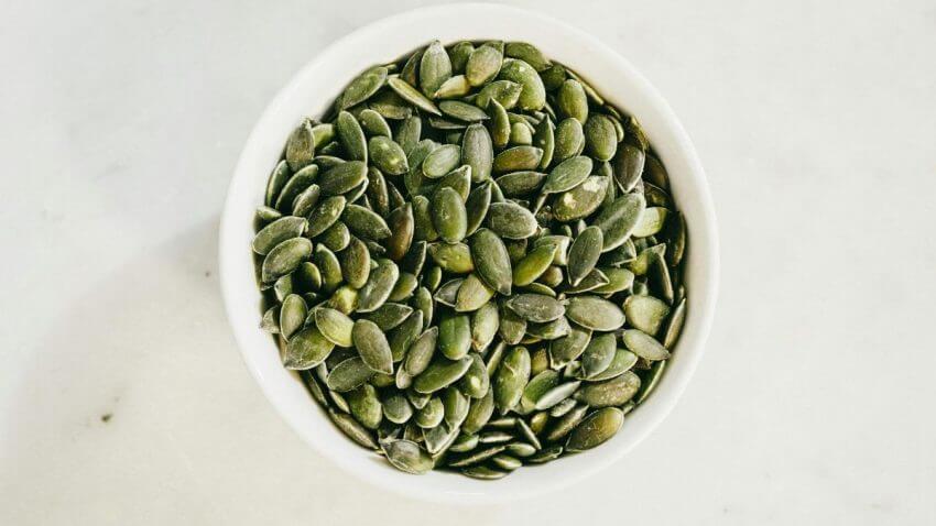 Hulled pumpkin seeds (pepitas), flat oval, green